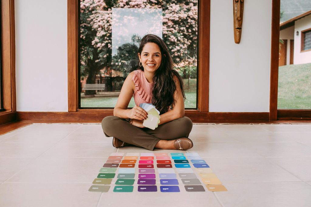 A woman selecting brand colours. This is an intro to my article "How many colours should a brand have"